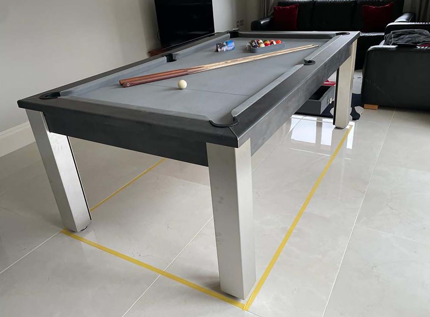 Grey pool table light grey tiled floor