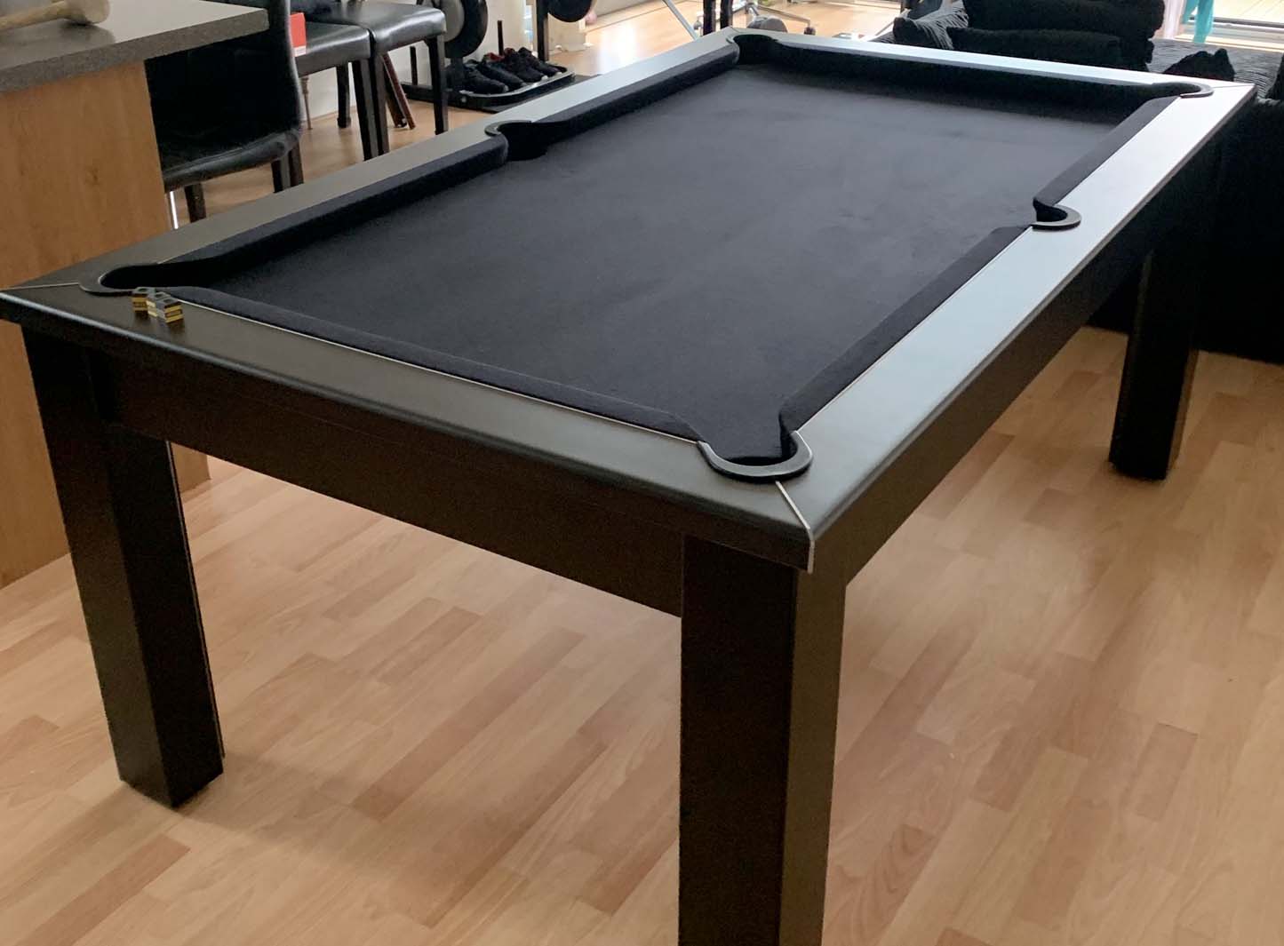 Black pool table with black cloth