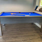 side view of a grey pool table and royal blue cloth