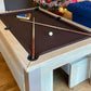 blue and brown pool balls, brown cloth games room christmas tree