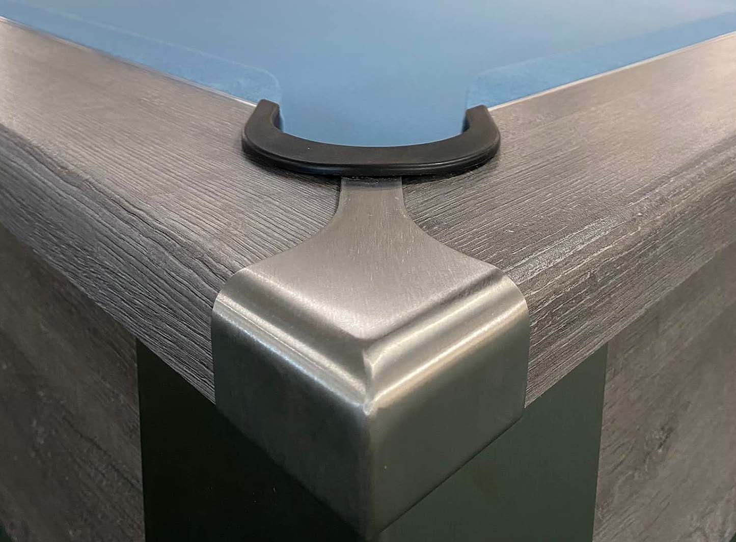 pool table corner pocket detail stainless steel cap pastel blue cloth grey frame