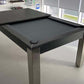 Dark grey pool table semi-covered