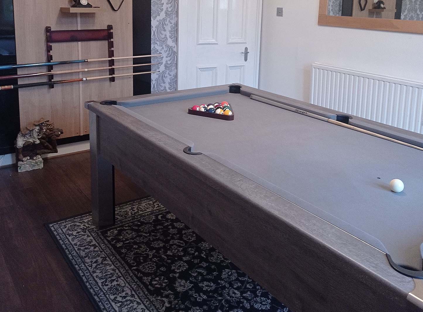 Games room with pool table setup ready to play