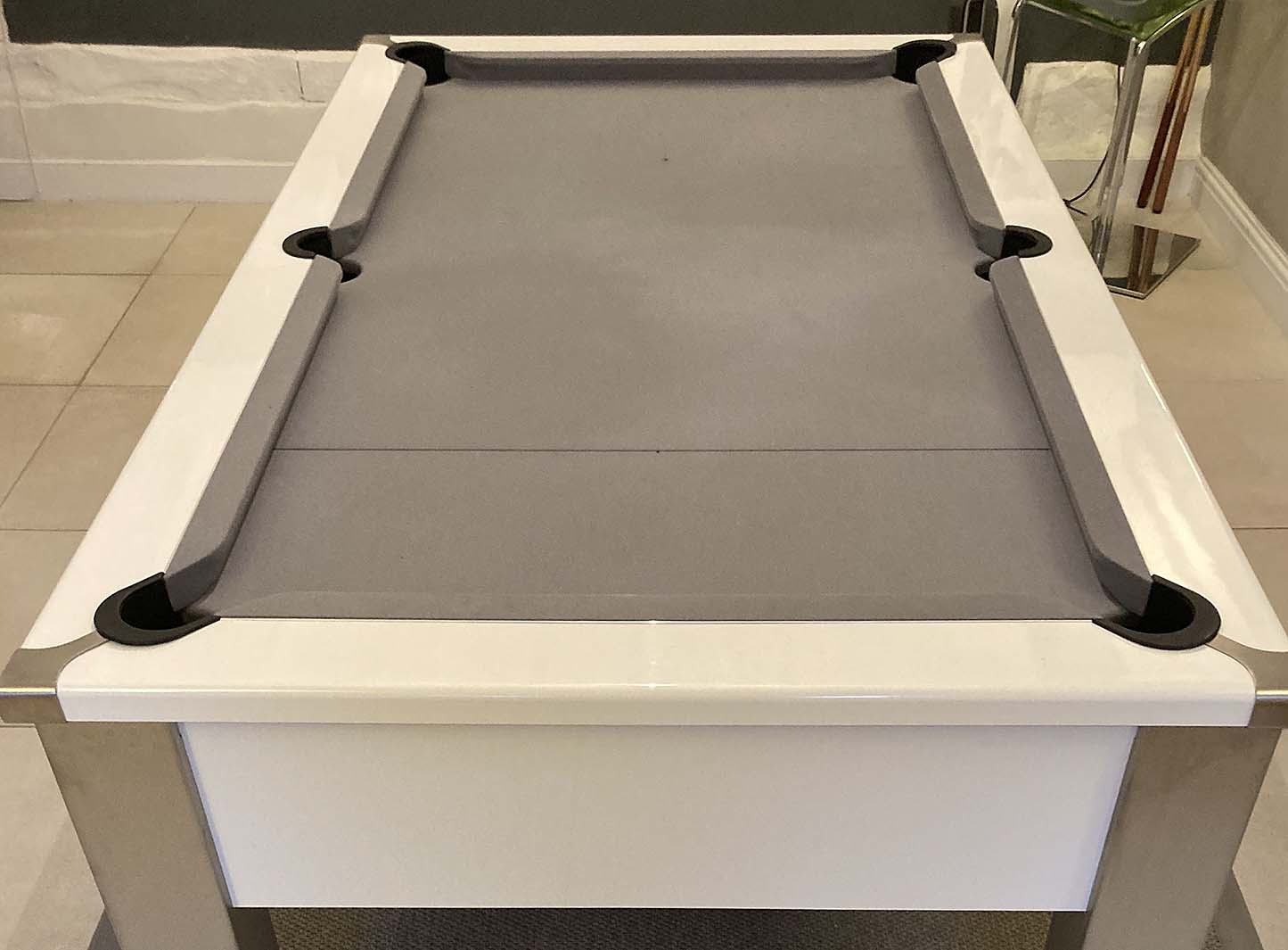 gloss white framed pool table with light grey cloth