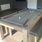 Games room with pool table setup to play