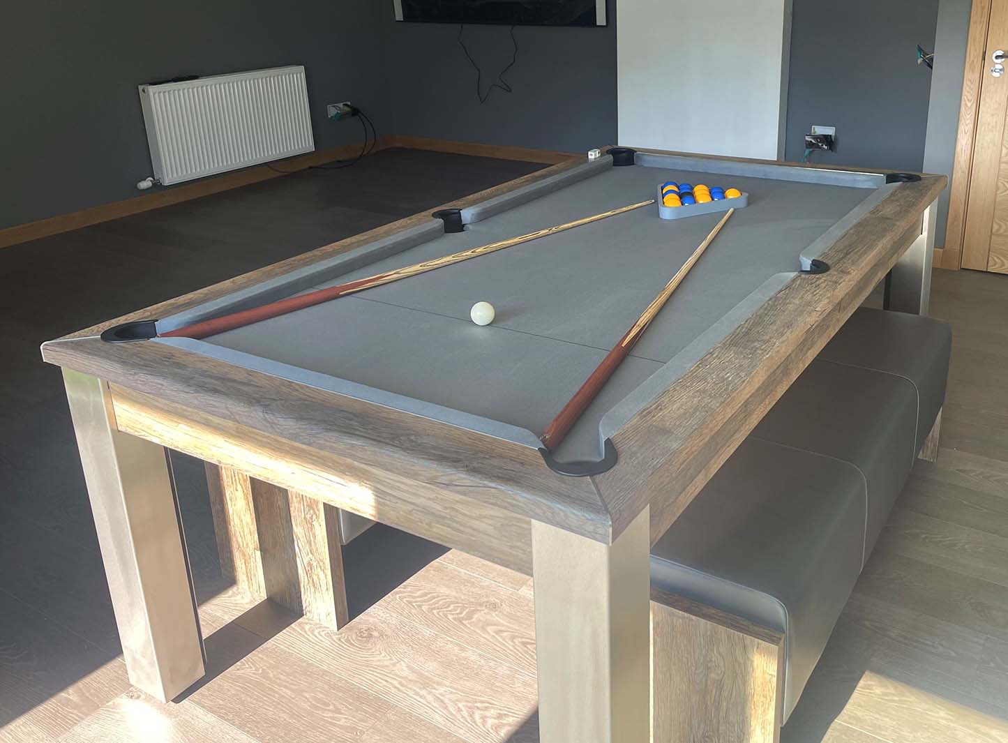 Games room with pool table setup to play