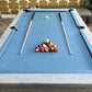 light blue cloth concrete pool table dining top