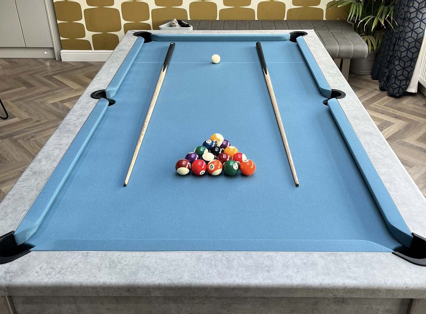 light blue cloth concrete pool table dining top