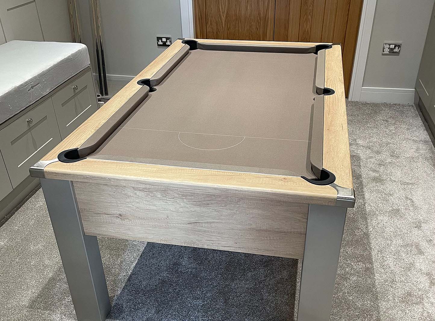 pool table with light brown cloth