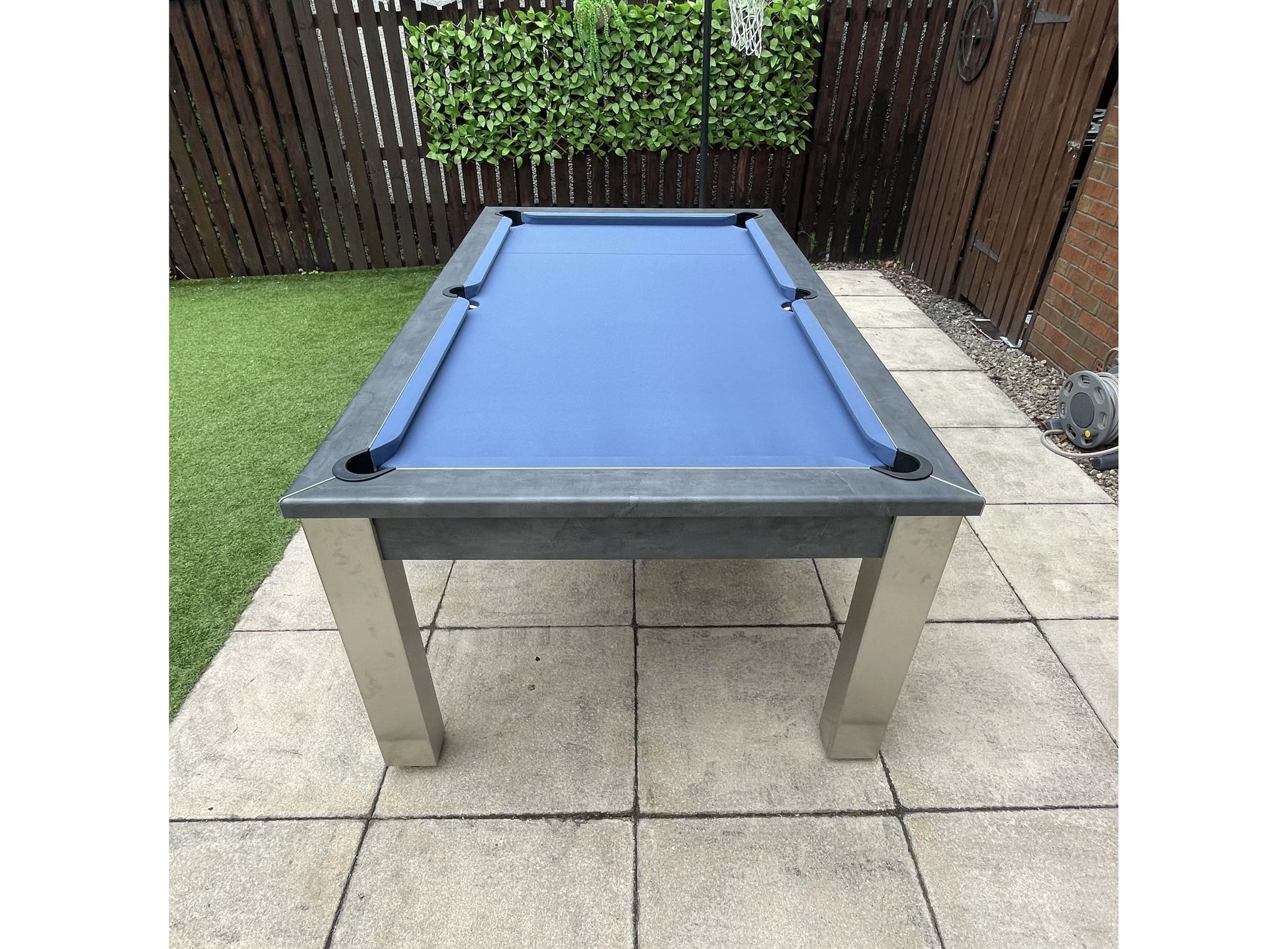 Blue cloth outdoor pool table