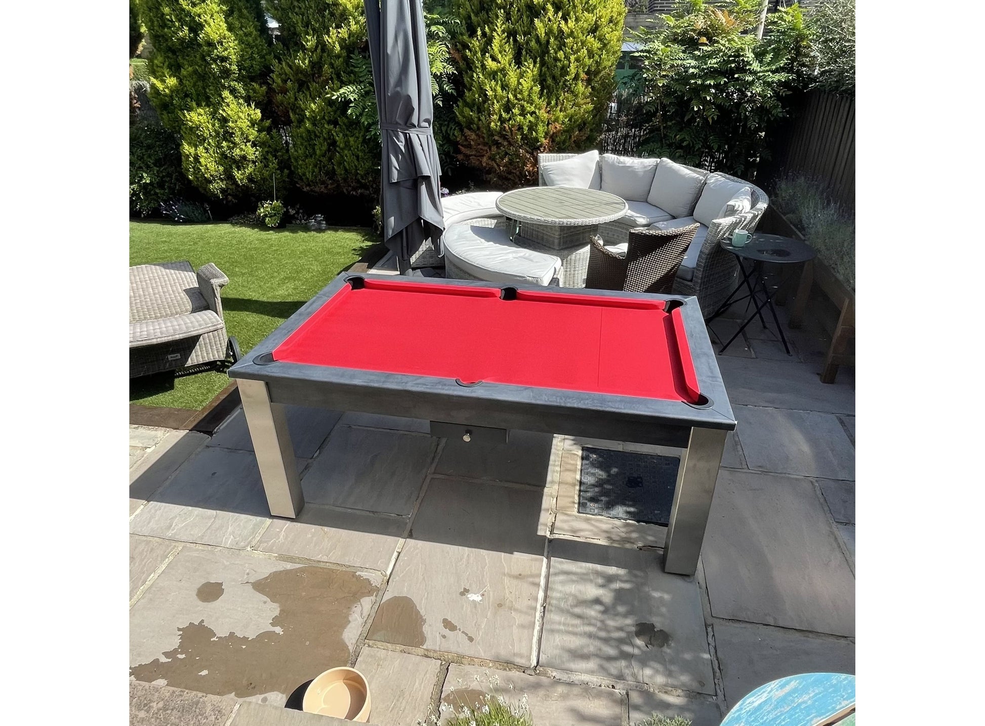 Red cloth outdoor pool table