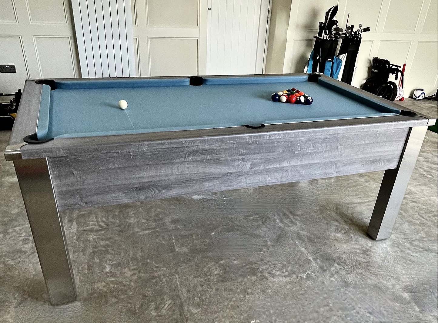 grey pool table and mid blue cloth