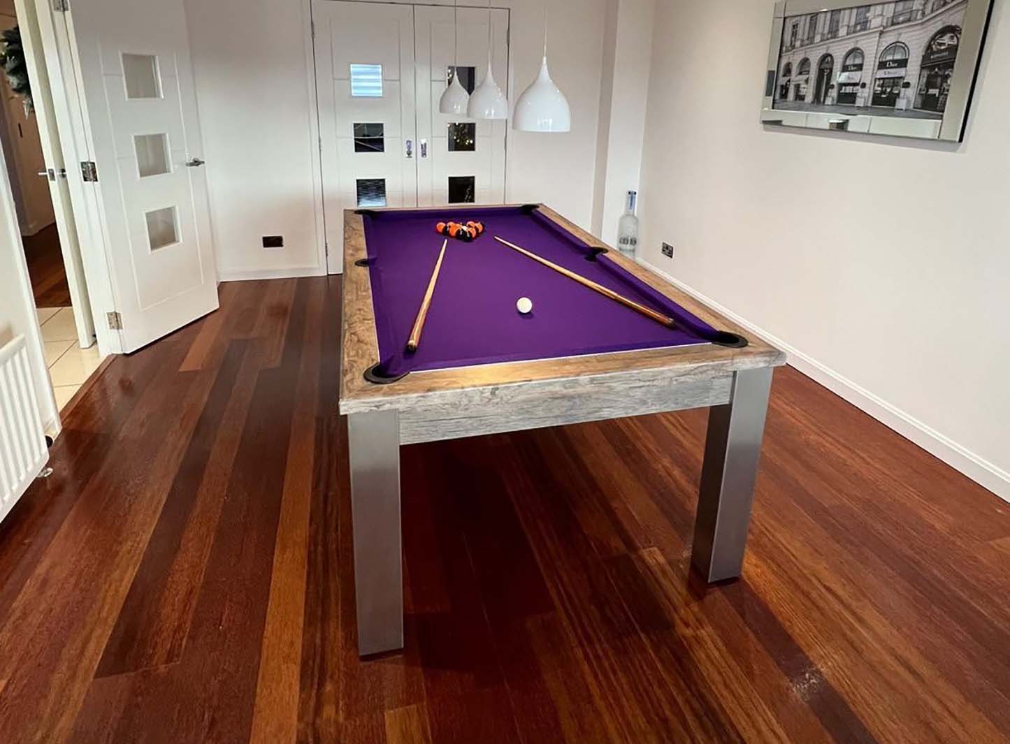 Pool table with purple cloth