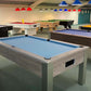 Pool table showroom with table lights various coloured cloths