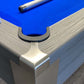 high quality stainless steel corner pocket protector on a grey pool table with royal blue cloth