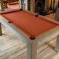 salmon coloured cloth on a rustic pool table