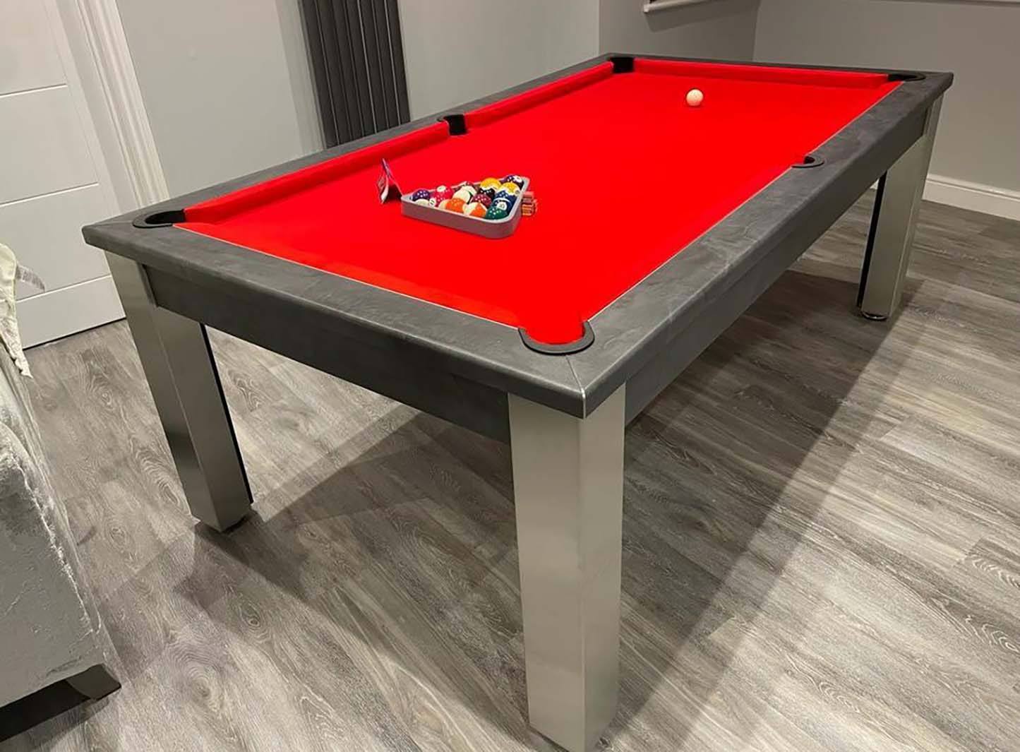 Red cloth grey pool table grey pool room