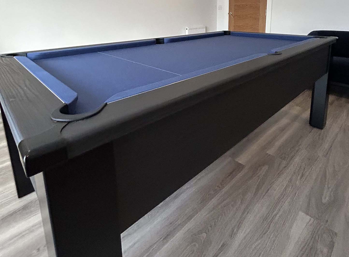 Black pool table blue cloth